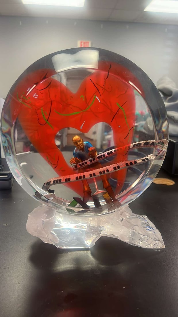 Marcus Glenn "Tapping' the Keys for the Love": Marcus Glenn "Tappin' the Keys for the Love" 2016 11 1/4" x 9 1/4" x 4 3/4" Lucite sculpture, Inscribed signature of the artist. Hand-signed in pigment by the artist. Appraisal