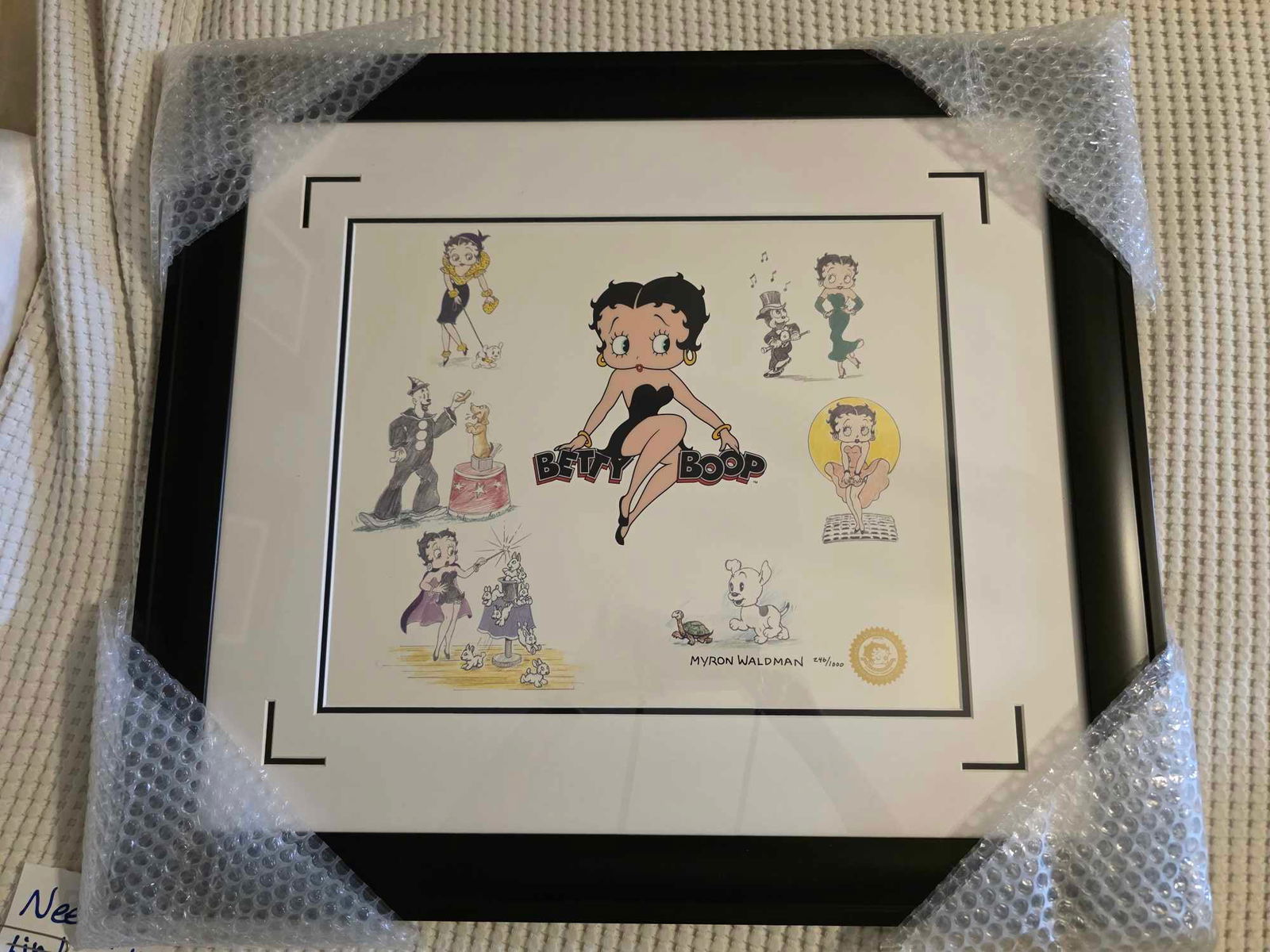 King Features, Inc. "Bravo Betty": King Features Inc "Bravo Betty" 1999 13 1/2" x 16 3/4" image size Sericel with color background. Signed by Myron Waldman. Gallery framed, COA, Appraisal