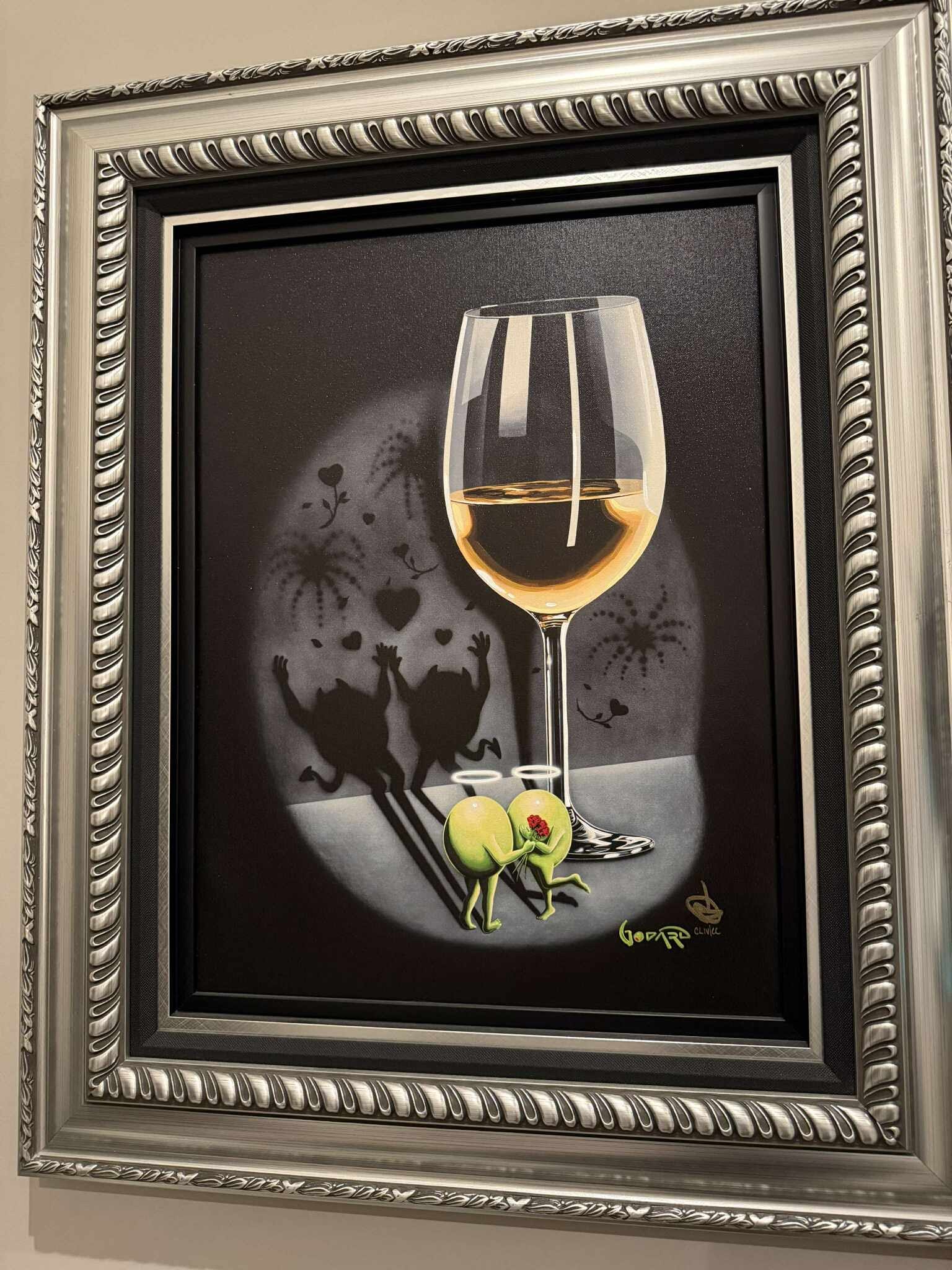 Michael Godard She Devil White Wine: Michael Godard "She Devil White Wine" 23 1/2" x 17 1/2" image size. Giclee in color with hand-embellishment on canvas. Hand signed in ink lower right by artist. Appraisal.Gallery Framed. GL