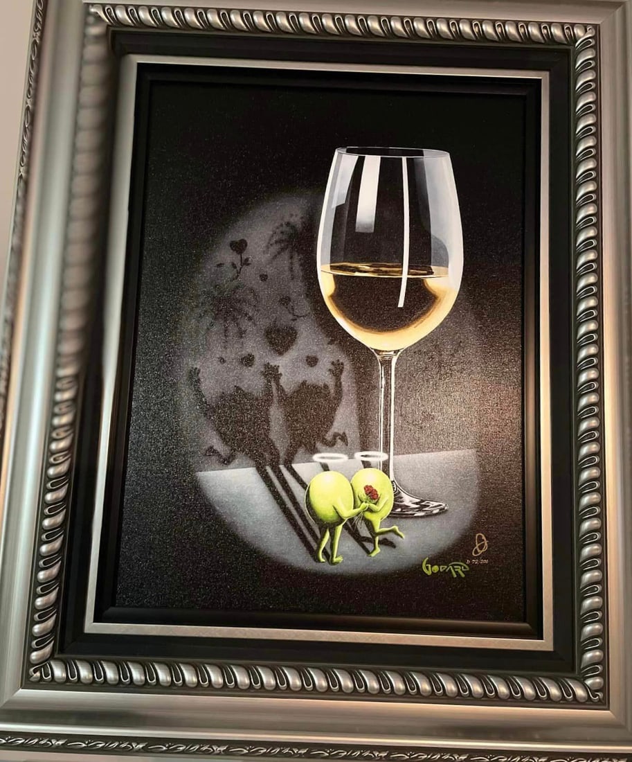 She Devil White Wine: Michael Godard "She Devil White Wine" 2020 23 1/2" x 17 1/2" image size Giclee in color with hand-embellishment on canvas. Hand-signed in ink lower right by the artist. Gallery framed LE 200