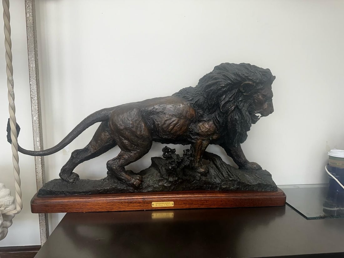 Lorenzo Ghiglieri Soveriegn Reign num 91/137: Lorenzo E. Ghiglieri, Sovereign Reign: #91/137 (This piece was made by Lorenzo and signed by the artist during his lifetime)Bronze lion sculpture, "Sovereign Reign", signed on the front between the