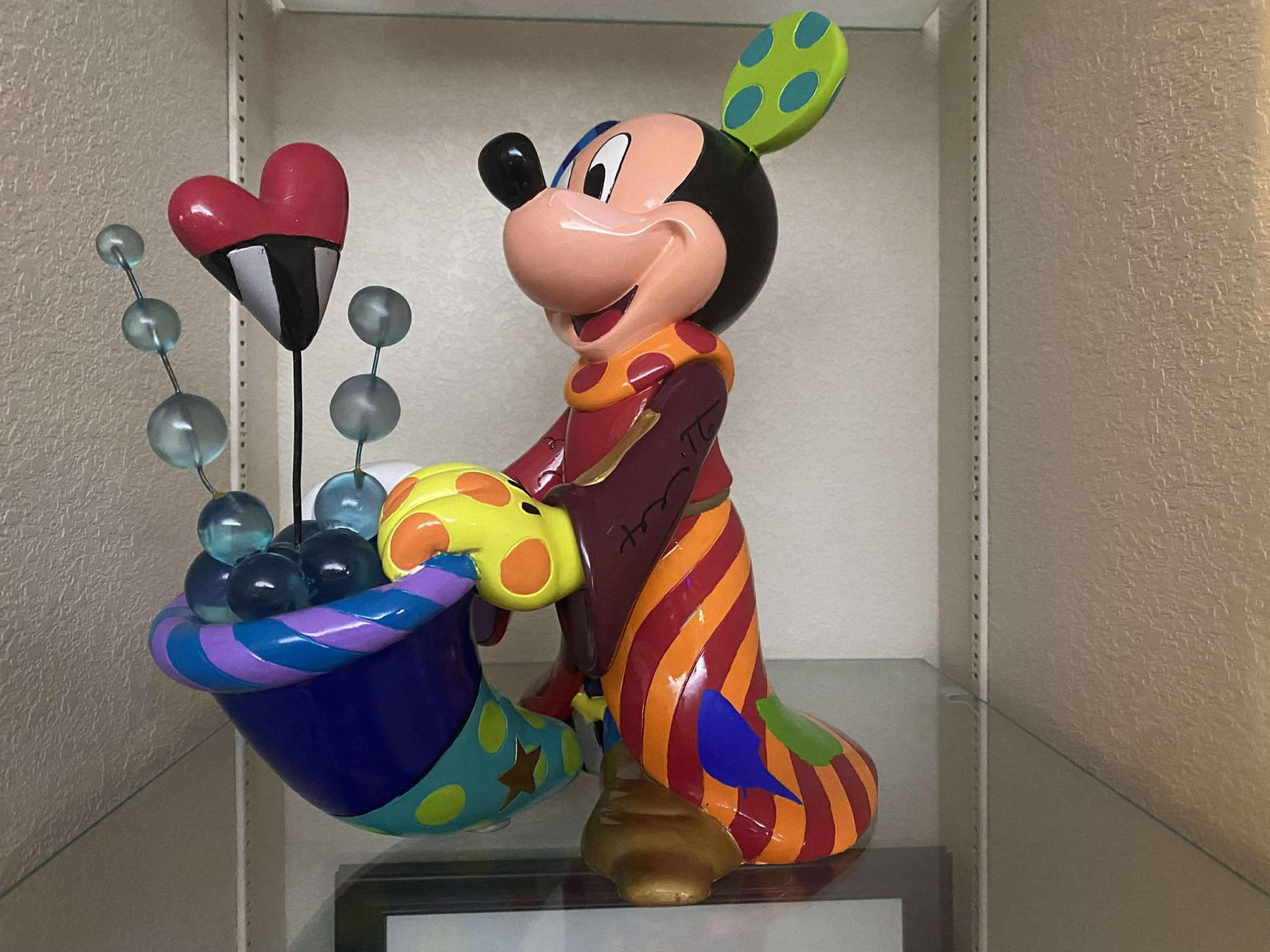 Romero Britto Sorcerer Mickey: Romero Britto "Sourcer Mickey" 2019 14" x 9" x 14 3/4" wood and resin sculpture with acrylic paint. Hand signed in oil pen by the artist in the lower right corner. A unique work. COA Appraisal