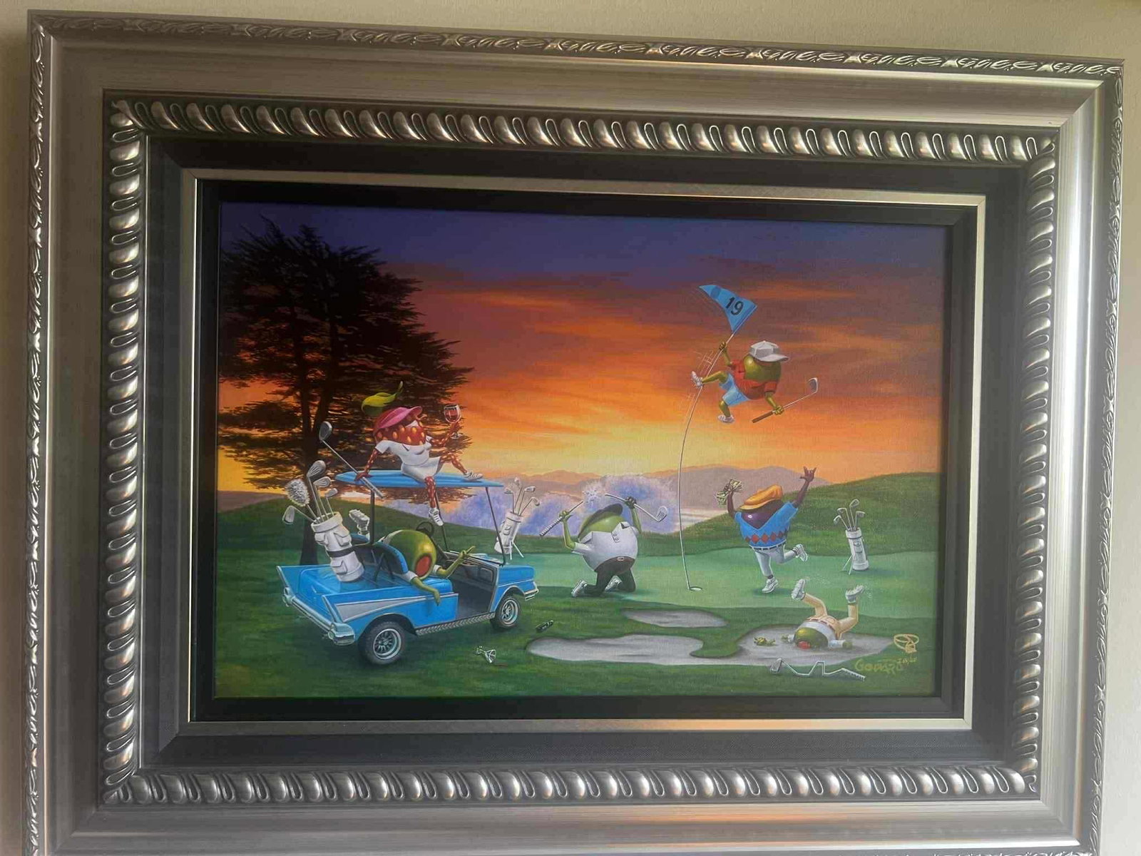Michael Godard Hole 19: Michael Godard "Hole 19" 2024 16" x 24" image size Giclee in color with hand-embellishment on canvas. Hand-signed by the artist. Gallery framed, COA, Appraisal SB