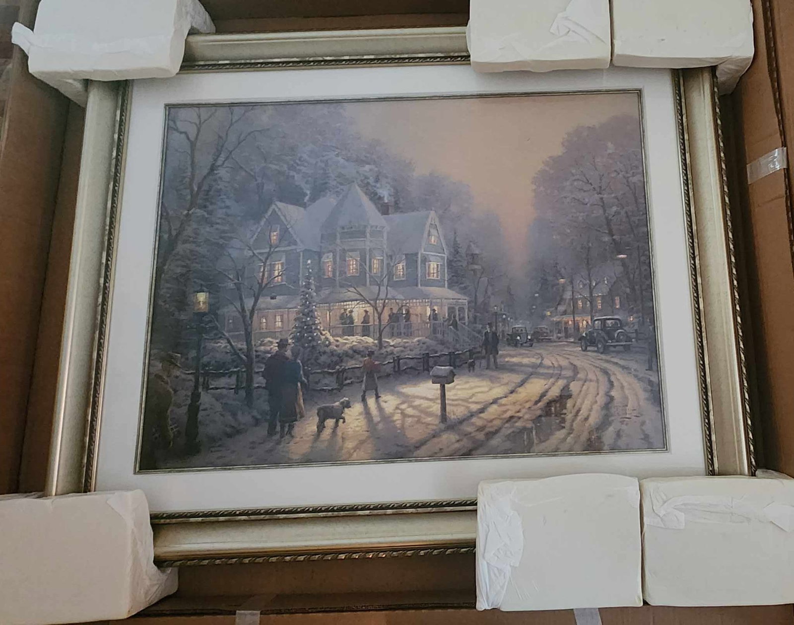 Thomas Kinkade Holiday Gathering: Thomas Kinkade "Holiday Gathering" 1998 25 1/2" x 34" image size image size and 36" x 46" framed, offset DNA matrix signature authentication system and numbered. Gallery framed, COA, appraisal