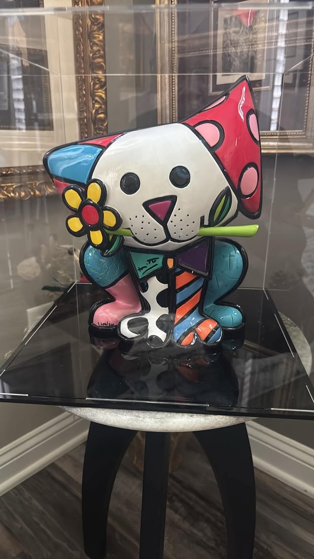Romero Britto Yellow Flower: Romero Britto "Yellow Flower" 12" x 10 1/2" hand painted sculpture Handcrafted in resin. Hand signed in pigment on the bow tie by the artist. COA. Appraisal. TH