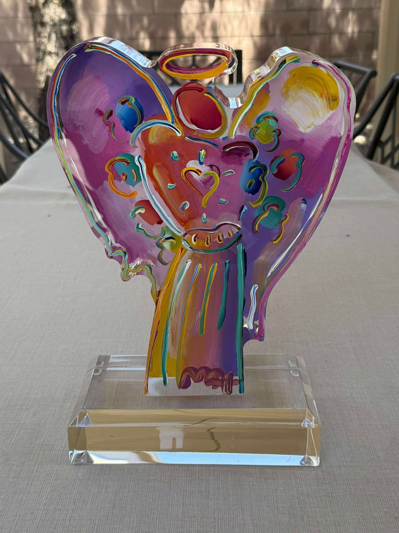 Peter Max Angel with Heart ver III num 98: Peter Max "Angel with Heart Ver. III #98" 2014 11 1/2" x 9" x 2" Hand-painted acrylic sculpture. Hand-signed in pigment lower center by the artist. A Unique work. COA Appraisal. ELJ