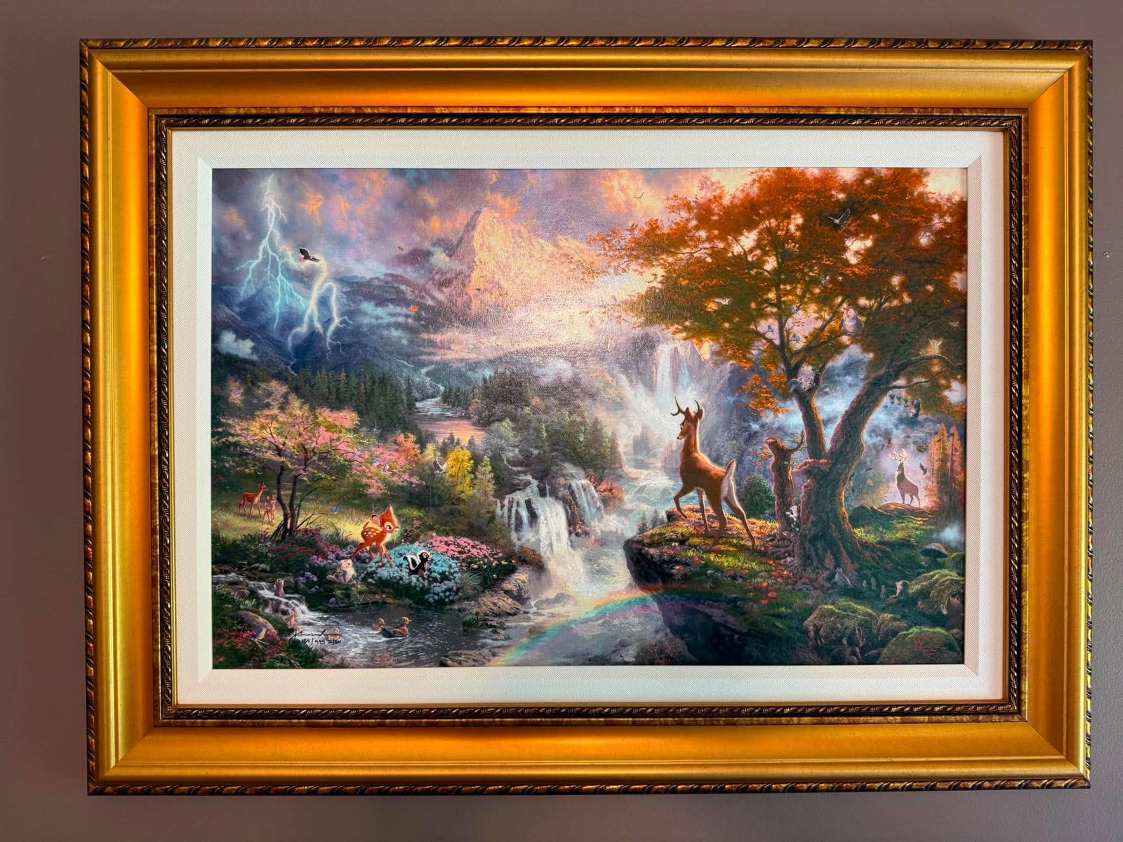Thomas Kinkade Bambi's First Year (MD): Thomas Kinkade "Bambi's First Year" (MD) 2018 18" x 27" image size Giclee in color with acrylic embellishments on canvas. Signed with the artist's authorized signature applied through the artist's