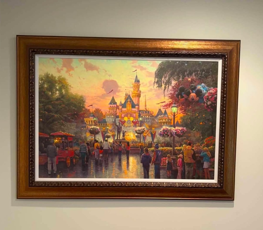 Thomas Kinkade Disneyland's 50th Anniversary: Thomas Kinkade "Disneyland's 50th Anniverasry" 2005 28 1/4" x 42 1/4" image size Giclee in color with acrylic embellishments on canvas. Signed with the artist's signature and numbered, Ballery