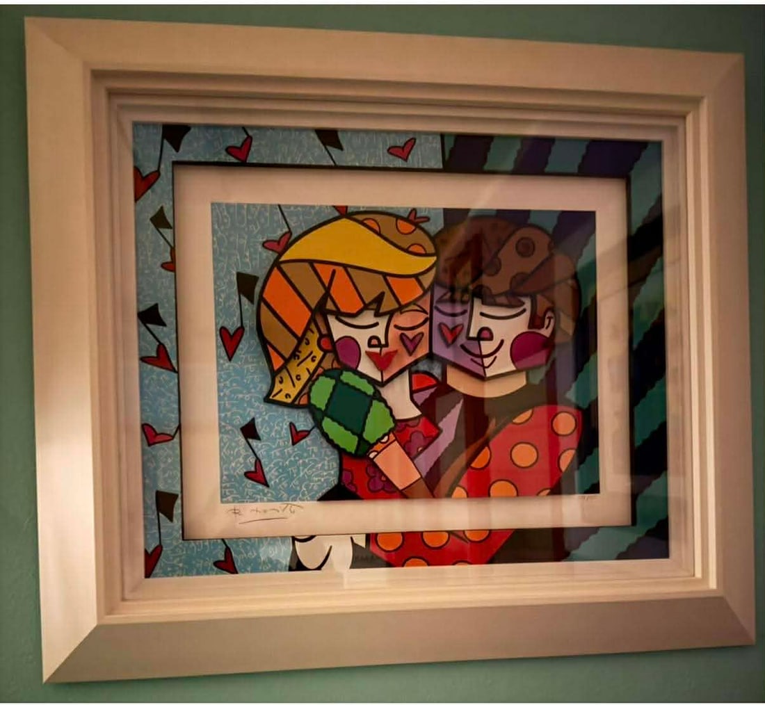 Romero Britto Blue Couple: Romero Britto "Blue Couple" 2016 22 1/2" x 27 1/2" image size Three-dimensional serigraphy construction in color with cut-outs in serigraphy. Hand signed in pencil lower left by the artist. Gallery