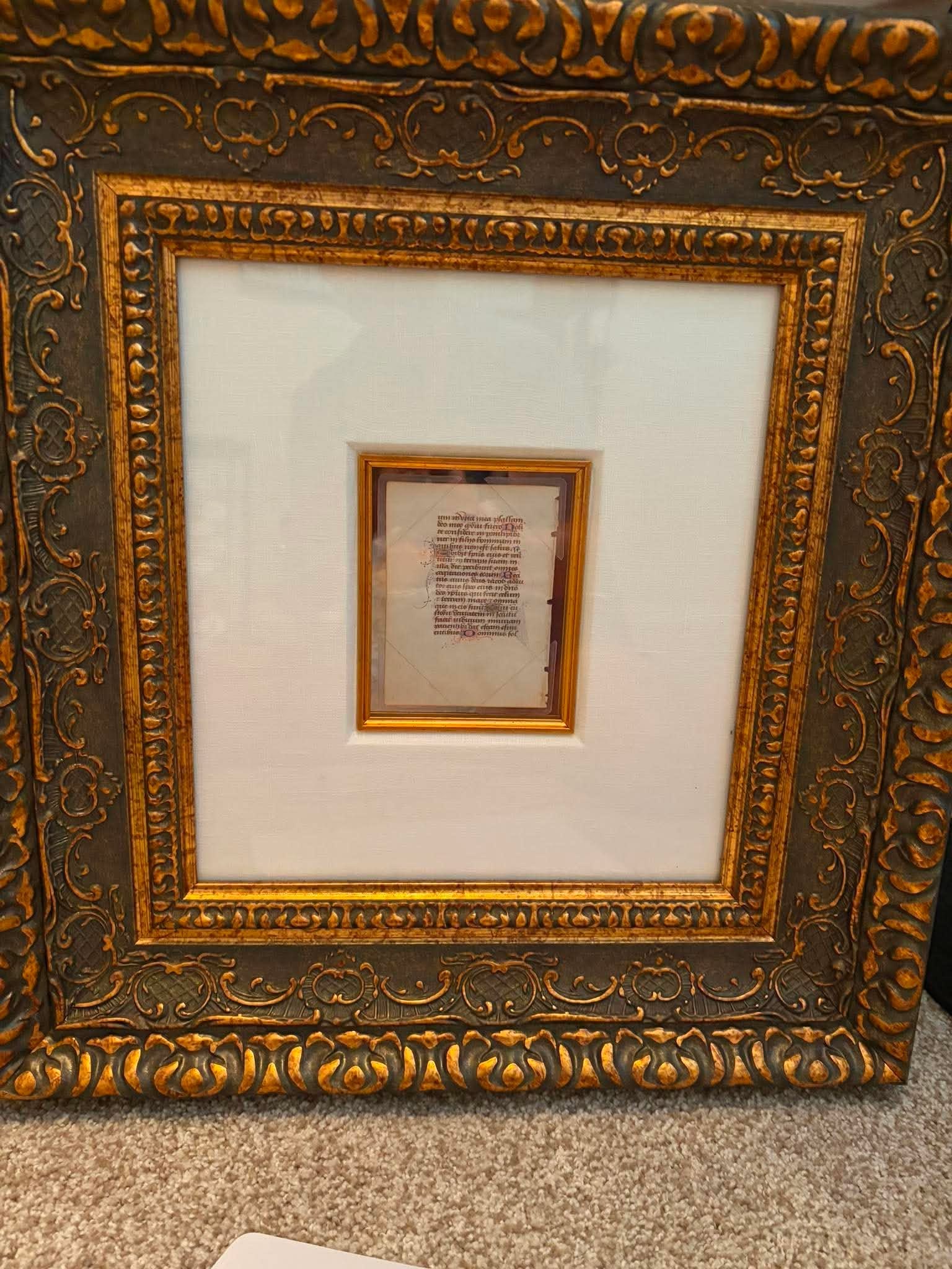 Manuscript Leaf from a Boof of Hours: Manuscript "Leaf from a Boof of Hours" c 1480 4 3/8" x 3 1/4" image size (Leaf) a lead on vellum from a Boof of Hours from Paris. With a 2 line penflourished initial with gliding 1 1line pen-flourishe