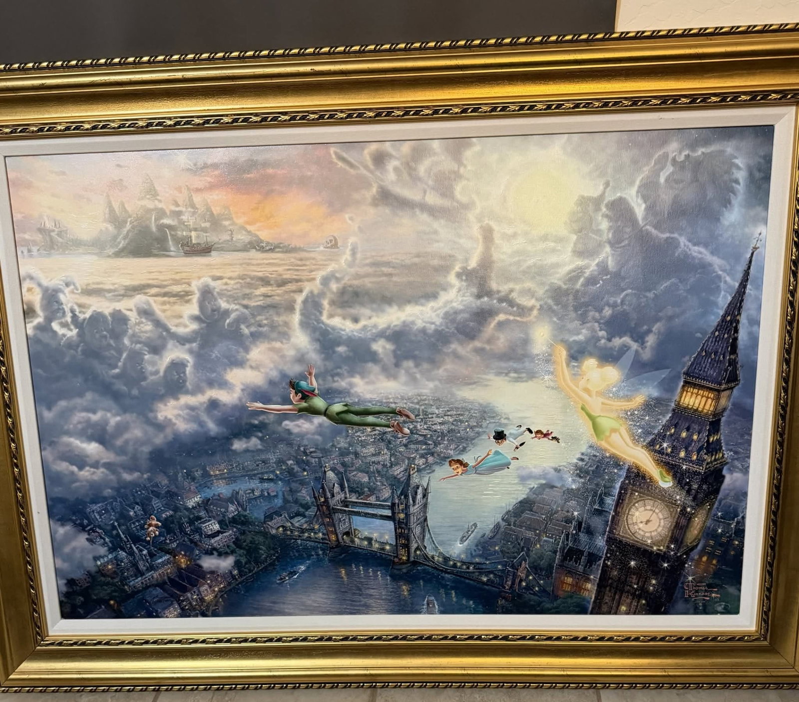 Thomas Kinkade Tinker Bell and Peter Pan: Thomas Kinkade "Tinker Bell and Pete Pan Fly to Neverland" 2009 24" x 36" image size Giclee in color with acrylic embellishments on canvas. Signed with the artist's authorized signature applied