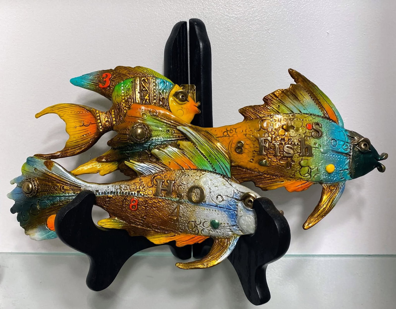 Nano Lopez Fishes going right: Nano Lopez "Fishies Going Right" 2014 6" x 10" x 1" Bronze sculpture with hand- applied patina. Signature stamped. Appraisal. Included framed giclee. AM