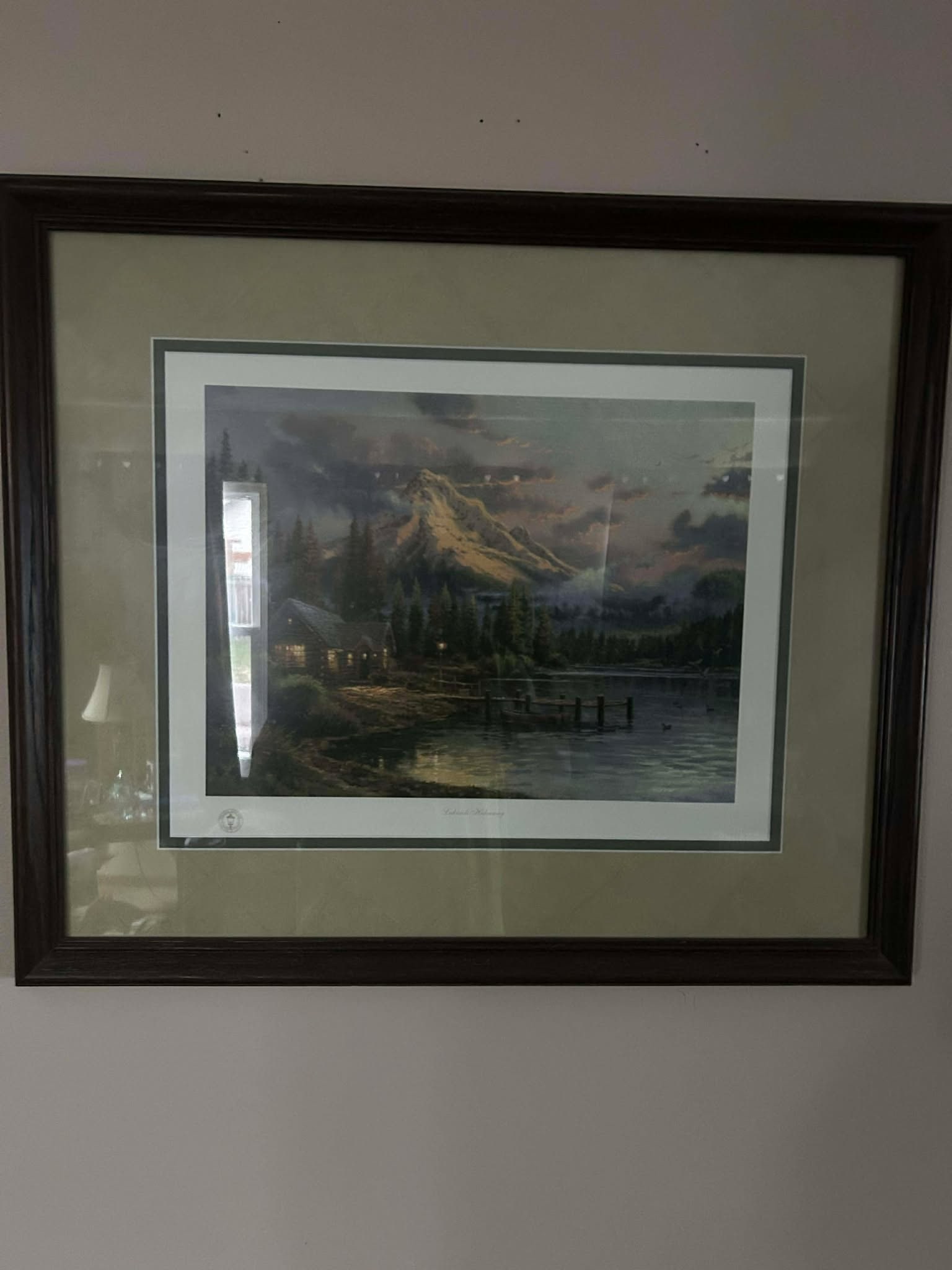 Thomas Kinkade Lakeside hideaway: Thomas Kincade "Lakeside Hideaway" 12" x 16" offset lithograph in color on premium paper. Signed with the artists DNA matrix signature authentication system and numbered. Gallery Framed. COA.