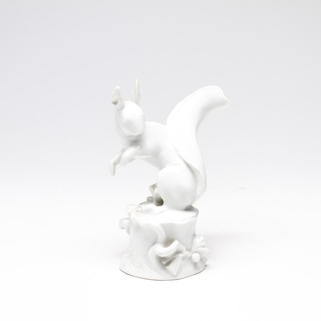 Meissen Fine German Porcelain Figure of a Squirrel: DIMENSIONS APPROX 6x6x14CM. Potential buyers should note that condition reports are matters of opinion only, they are non-exhaustive and based solely on what can be seen to the naked eye unless otherw