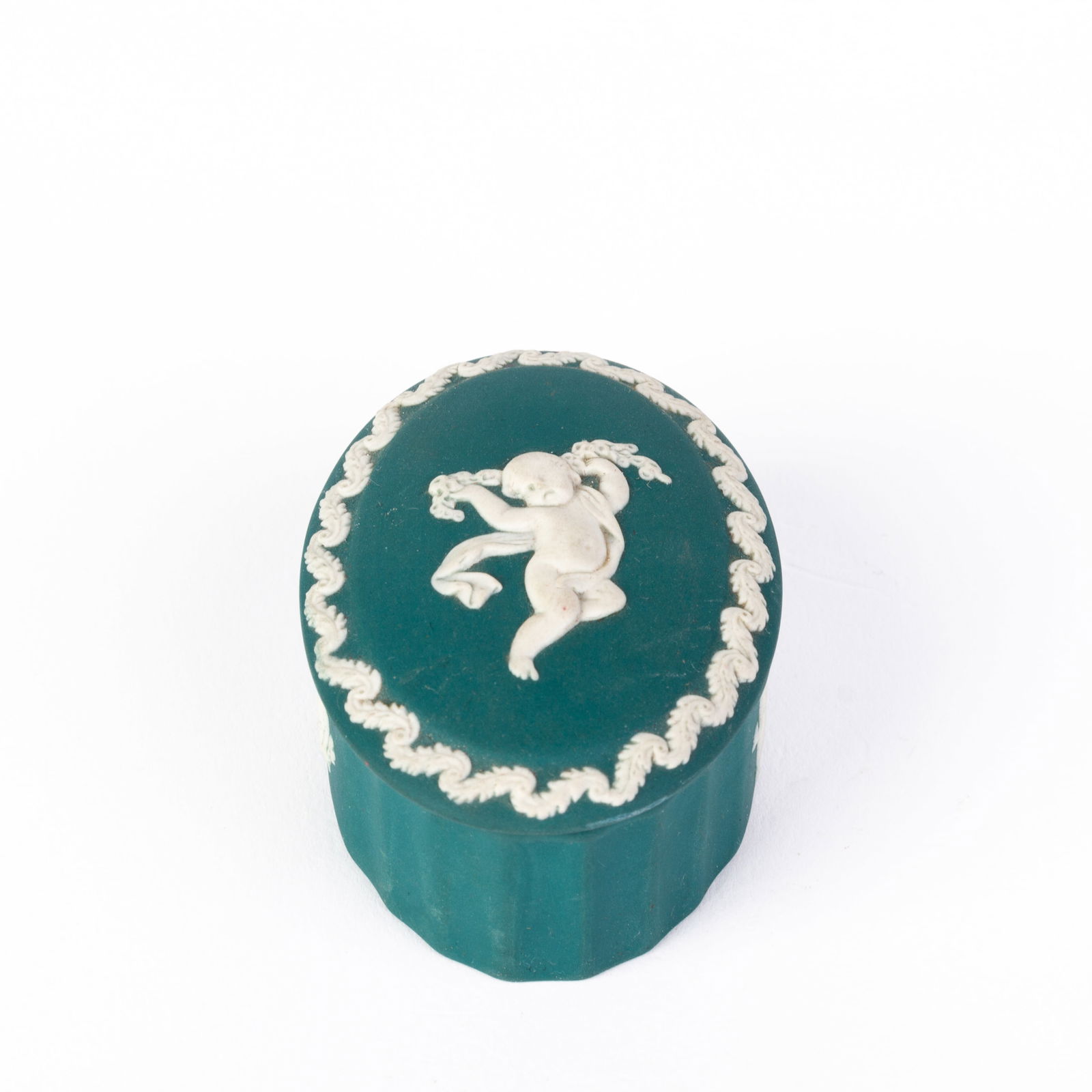 Wedgwood Turquoise Jasperware Putto Trinket Box: DIMENSIONS APPROX 7x5x4CM.