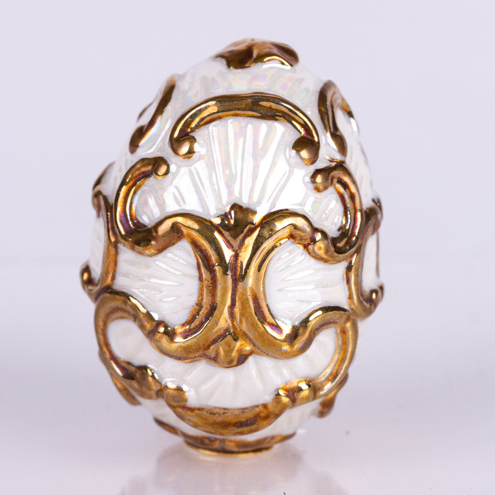 House of Faberge Gilded Egg: DIMENSIONS APPROX 3.5x2.5x2.5CM.