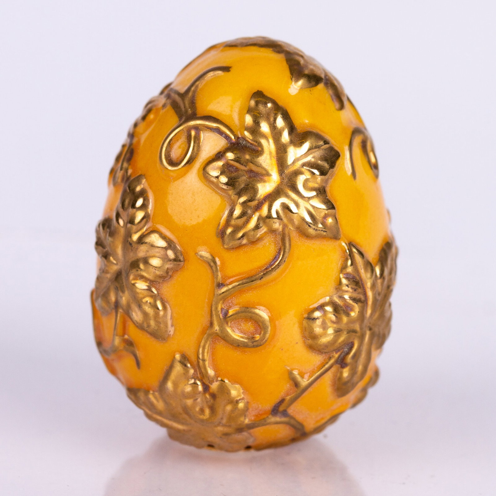 House of Faberge Gilded Egg: DIMENSIONS APPROX 3.5x2.5x2.5CM.