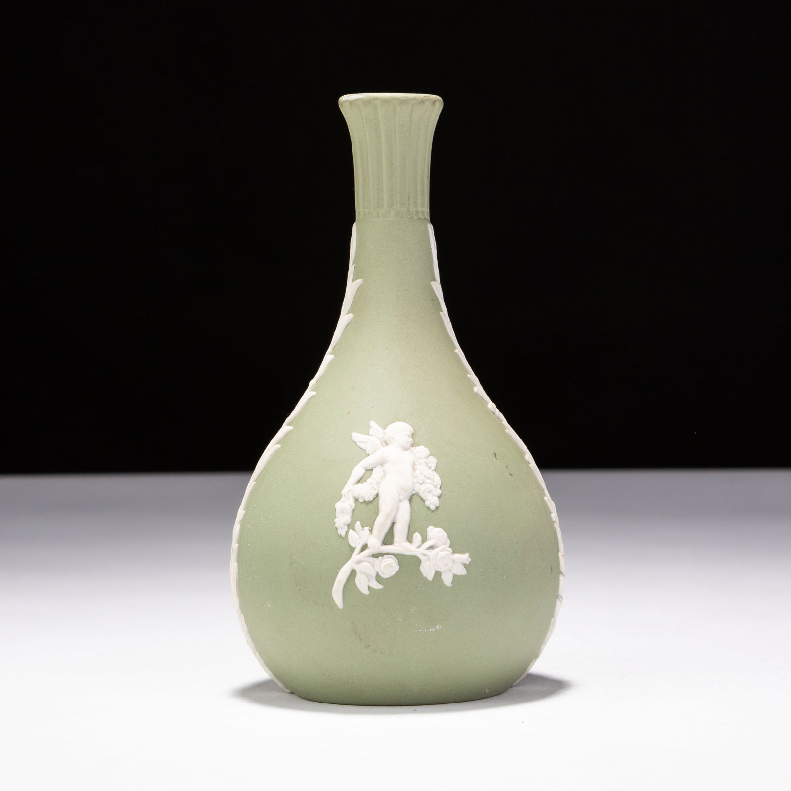 Wedgwood Green Jasperware Neoclassical Spill Vase: MEASURES APPROX 7.5 X 13.5CM HIGH.
