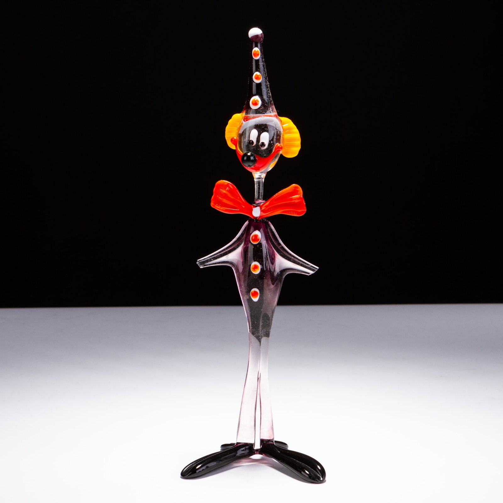 Murano Venetian Glass Clown Sculpture: MEASURING APPROX 8 X 26CM HIGH.