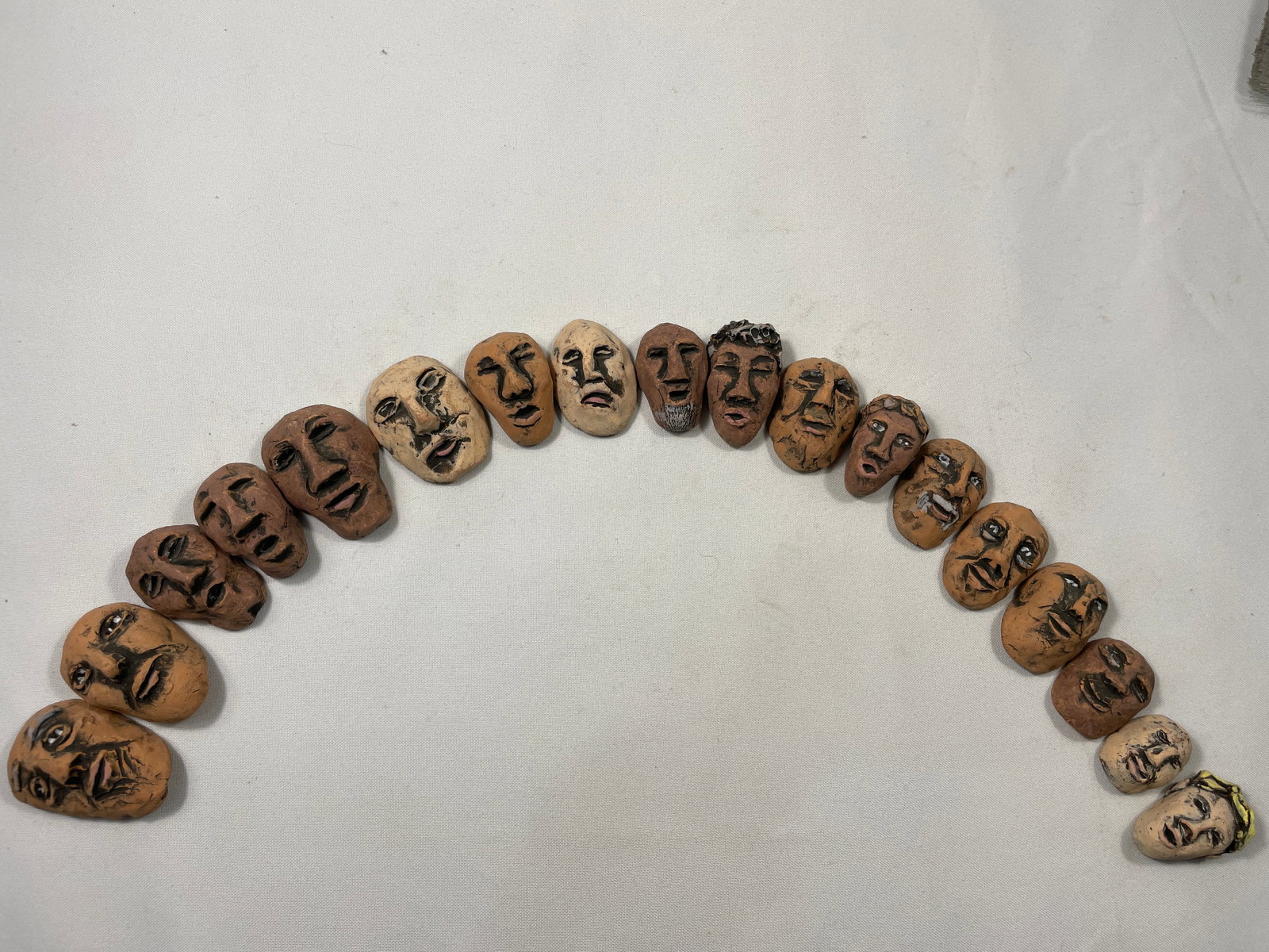 - 18 pieces - Faces in Clay (1 of 8)