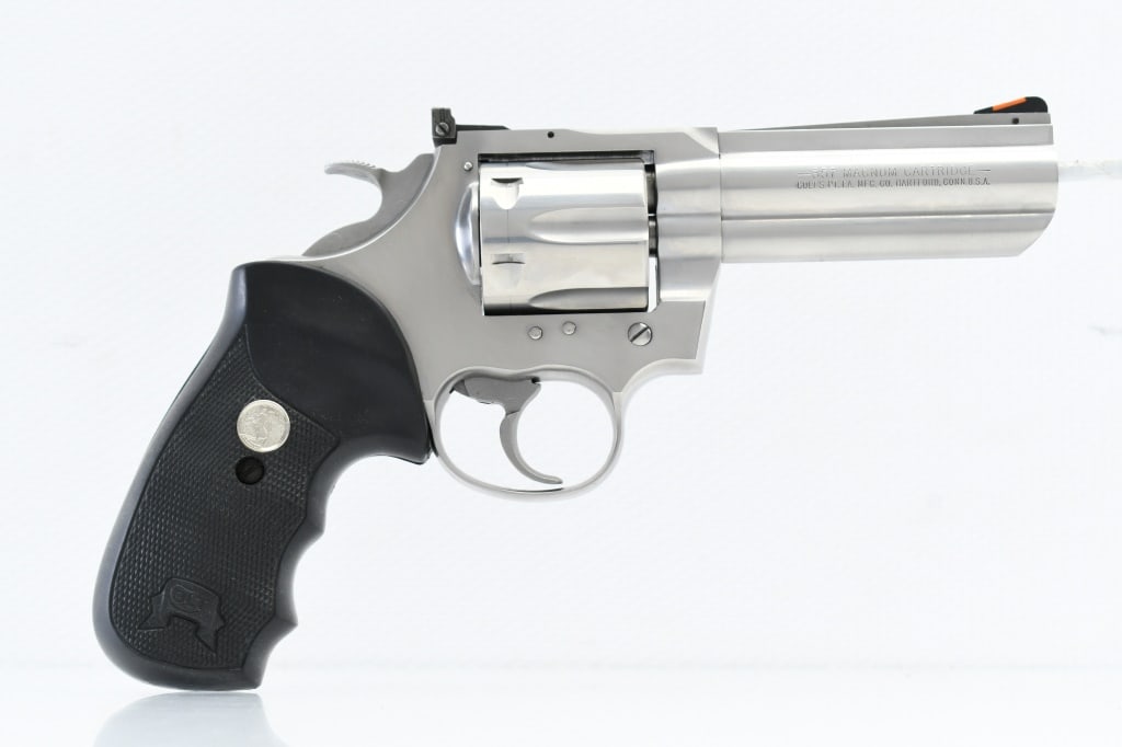 1996 Colt King Cobra - Stainless (4"), 357 Magnum/ 38 Spl., Revolver, SN - KS2827: According to Colt Archives Serial Number Database, this King Cobra was produced in 1996. SPECS: Stainless steel finish, 4" ribbed barrel with full length lug & shrouded extractor rod, adjustable rear 