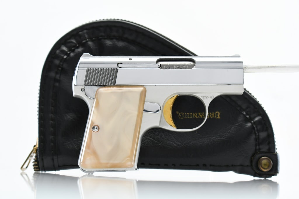 1968 Browning Baby Lightweight - Factory Chrome, 25 ACP, Semi-Auto (W/ Case), SN - 421264: According to Browning's .25 Automatic Pistol serial number chart, this "Baby" Browning was produced in 1968. SPECS: Silver-anodized aluminum alloy frame, gold-finished trigger, chrome-plated slide, sa