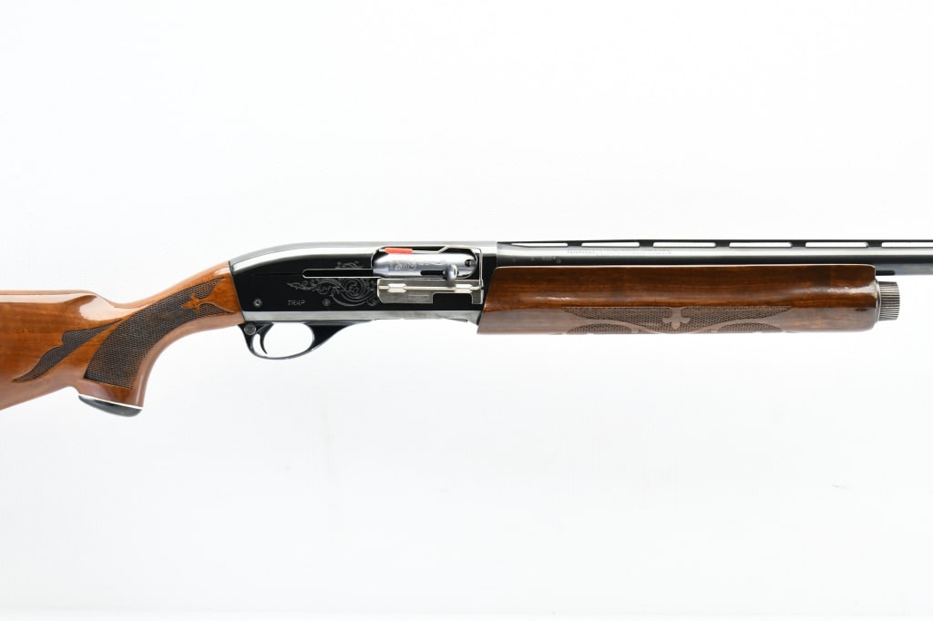 1971 Remington 1100 Trap (30" FULL), 12 Ga., Semi-Auto, SN - L510891V: The serial number & date code on this Model 1100 Trap represents an April of 1971 production date. SPECS: Checkered walnut stock with fleur-de-lis pattern/ high fluted comb/ contoured forearm & gloss 