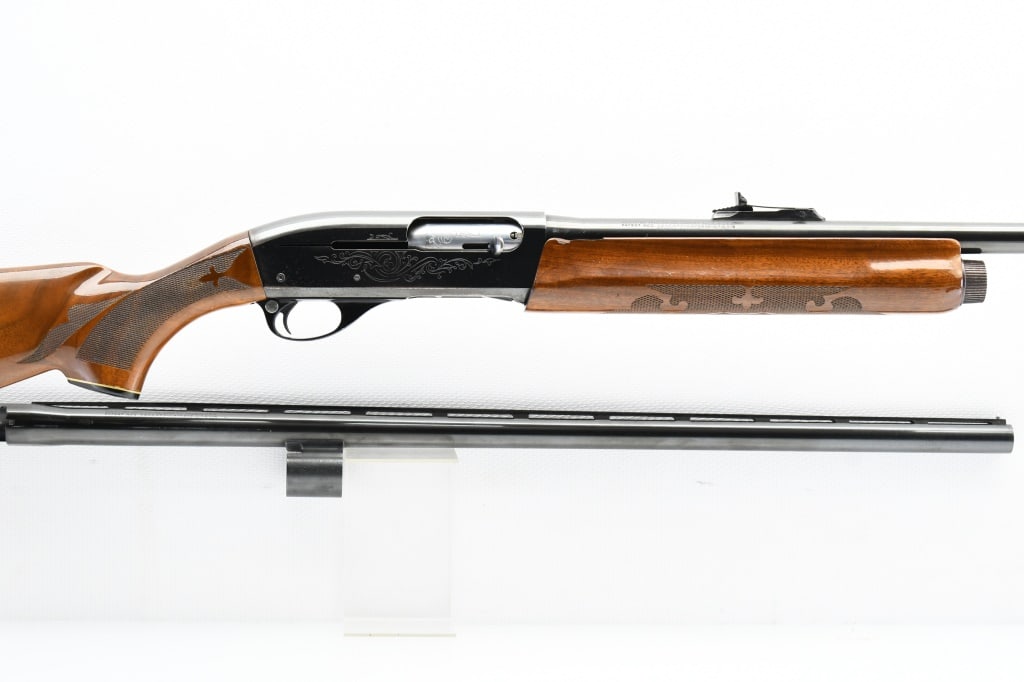 1970 Remington 1100 Combo (22" DEER & 28" MOD), 12 Ga., Semi-Auto, SN - L286275V: The serial number & date code on this Model 1100 Combo represents a July of 1970 production date. This shotgun comes with a 22" smooth deer barrel with adjustable ramp rear sight & ramped dovetailed b