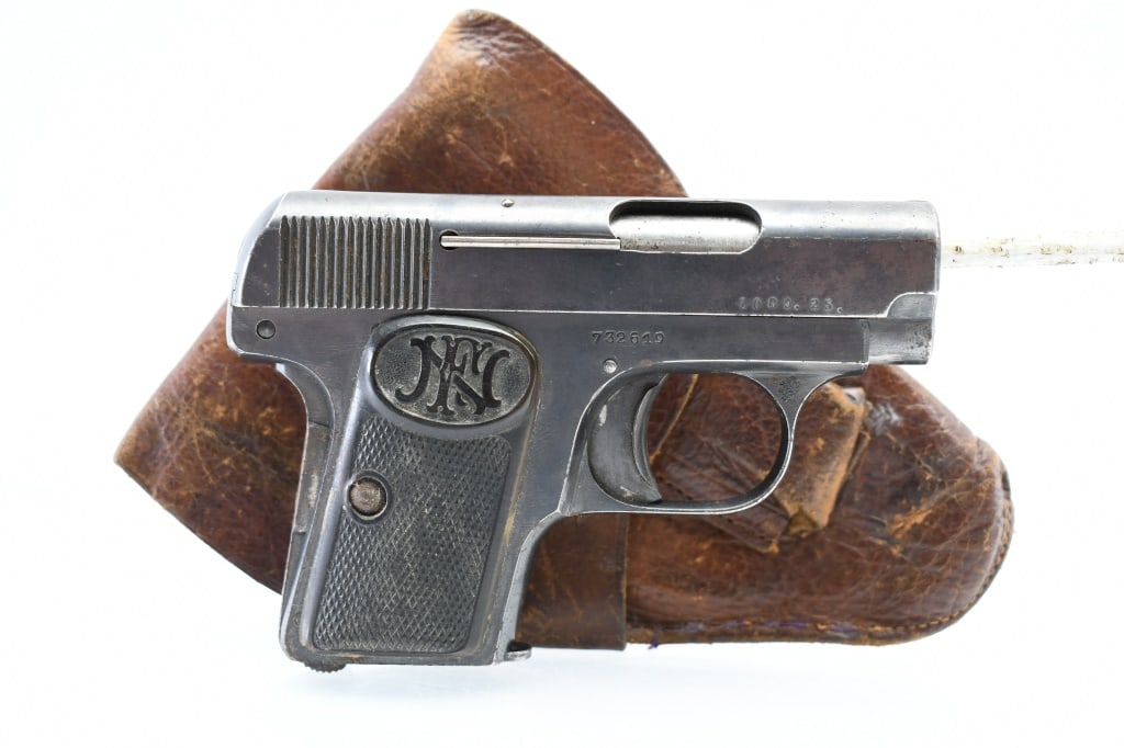1920s FN Browning Model 1905, 25 ACP, Semi-Auto (W/ Holster), SN - 732619: SPECS: 2" Barrel, black checkered grips with embossed "FN" logo, rear slide serrations, grip safety, checkered thumb safety, fixed groove sight and 6-round magazine. This pistol comes with a period co