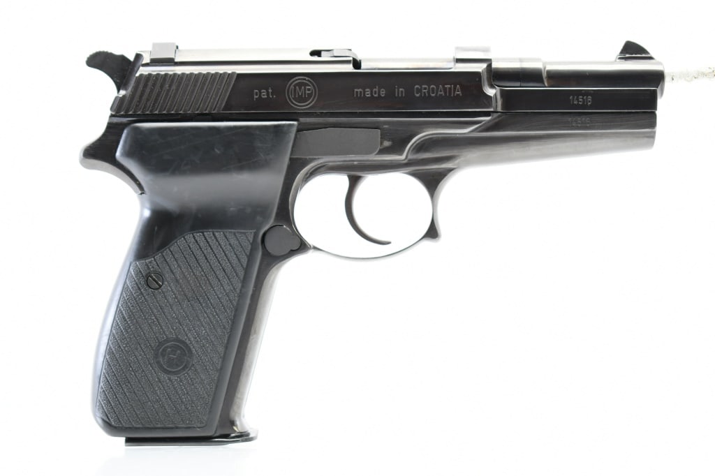 Circa 1994 Croatian IMP PMP MV (4"), 9mm Para, Semi-Auto, SN - PHP00261: This IMP PMP service pistol was produced in Croatia by IM Metallic in circa 1994, and imported to the U.S. by CAI. SPECS: SA/DA trigger, polished blued finish, black composite grips with stippled text