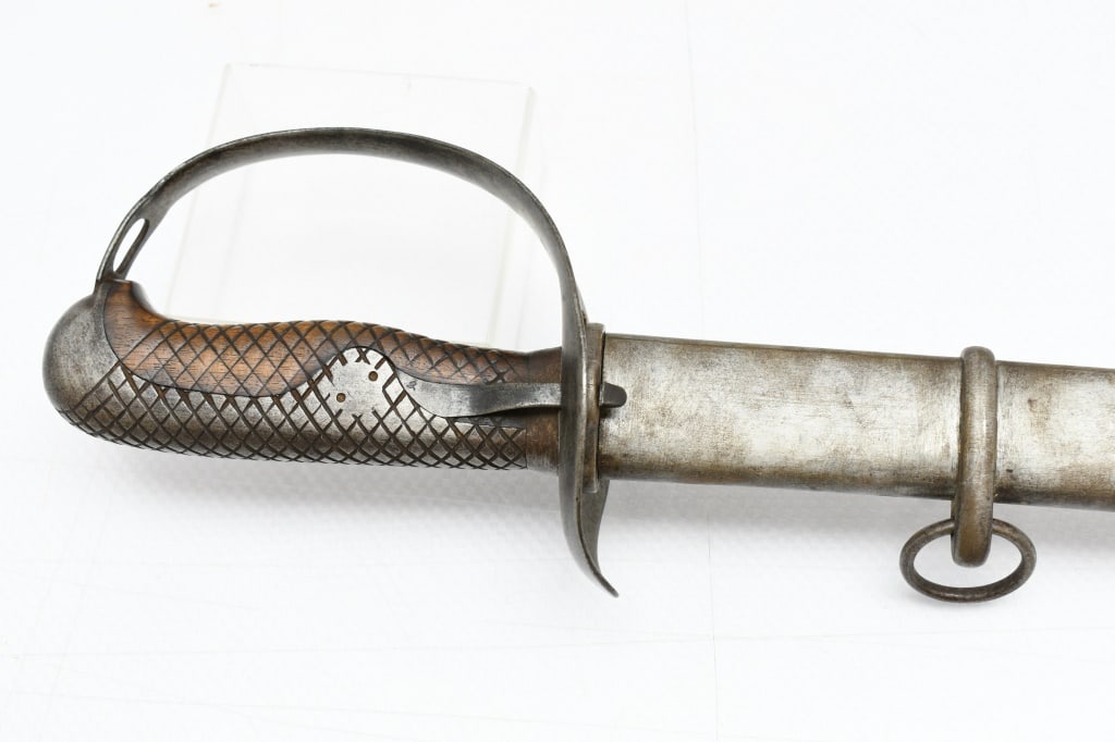 Circa WWI Japanese Model 1889 Type 32 "KO" Cavalry Saber W/ Scabbard: The Japanese Model 1889 Type 32 Cavalry Saber was in service during the Russo-Japanese War, World War One and World War Two. Two patterns of the Type 32 were produced. The earlier one known as "KO" wa