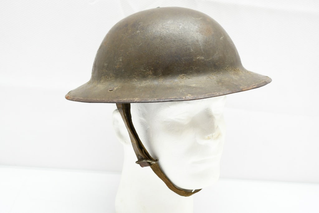 WWI British/ American MkI Brodie Helmet W/ Liner & Strap, By W. Hutton & Sons: This WWII Brodie Helmet was produced in Britain by W. Hutton & Sons and is the same type that was issued to American forces in the beginning of the U.S. involvement in WWI. This helmet is marked "H.V.
