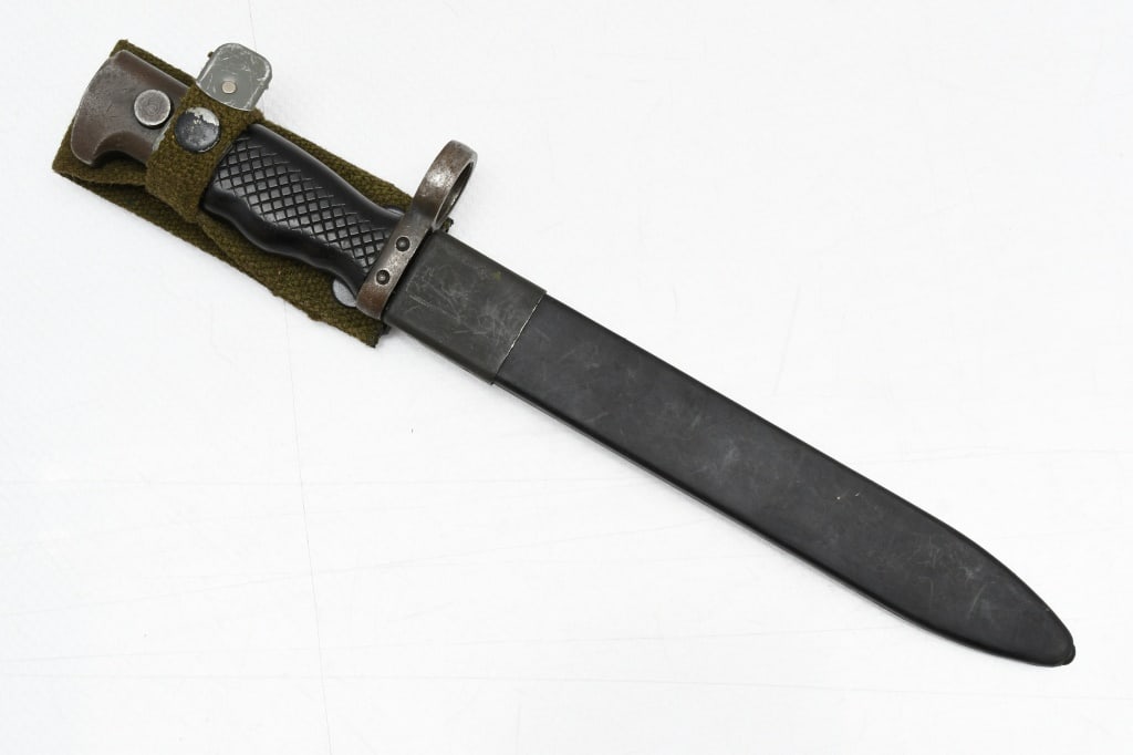 Spanish M1964 CETME Rifle Bayonet (8.75" Blade) W/ Scabbard: This Spanish M1964 knife/bayonet is for use on the CETME (7.62 NATO) and FR–7/ FR–8 training rifles. SPECS: Checkered black plastic grips, 8.75" blade, 13.25" overall length and plastic sc