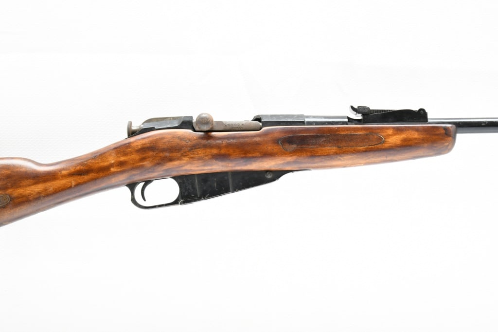 Sporterized - Romanian Mosin-Nagant Short Rifle (21"), 7.62x54R, Bolt-Action, SN - 30242: This Romanian Mosin-Nagant short rifle sports a glossed black finish on the barrel & receiver. The only original makings that remain visible are a few Romanian arrowheads in triangle stamps. This gun