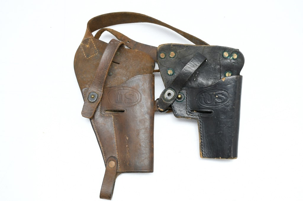 (2) U.S. WWII M3 Leather Shoulder Holsters - For 1911 Pistols: (A) - Brown leather M3 shoulder holster with snap & sling, marked "U.S." on the front & "U.S./ ENGER-KRESS/1944" on the back. (B) Black leather "cut-down" holster with riveted loops (no sling) & snap,