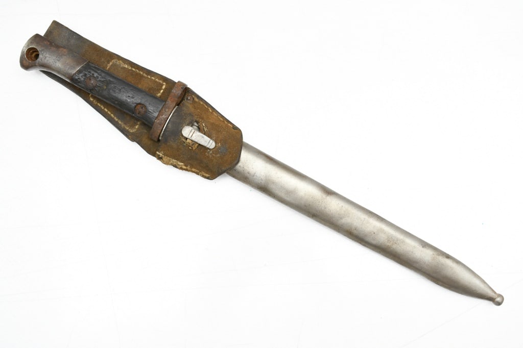 Czech VZ–22 Bayonet (9.75" Blade) W/ Scabbard & Frog: This knife/bayonet is for use with the 8mm Czechoslovakian vz. 98 and vz. 98/22 Mauser rifles. SPECS: 9.75" Blade, 12.5" scabbard length, 15" overall length, metal scabbard and brown leather frog. CON