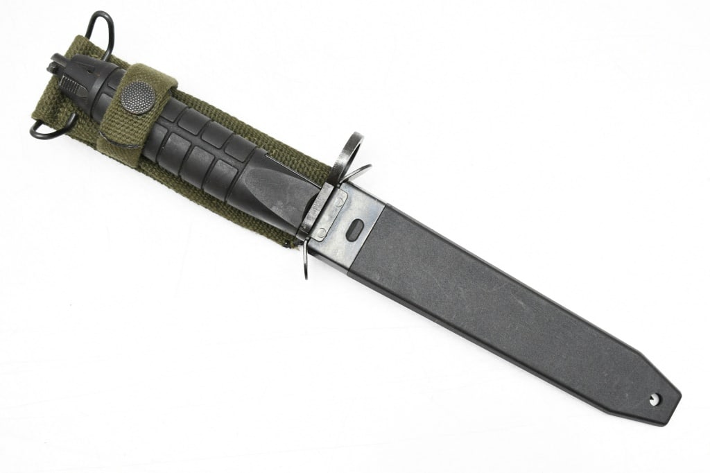 Danish M1975 (G3) Bayonet (6.75" Blade) W/ Scabbard: This knife/bayonet is for use on the 7.62 mm NATO caliber Gevaer M/75 assault rifle which is a variant of the German G3A3. SPECS: 6.75" Blade, 12.25" overall length and black plastic scabbard with nyl