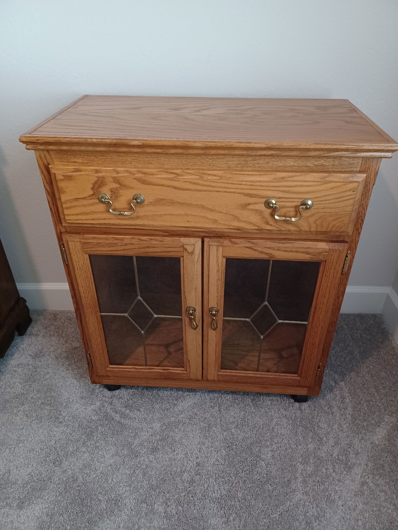 Oak Cabinet with Leaded Glass on Wheels: Oak Cabinet with Leaded Glass on Wheels