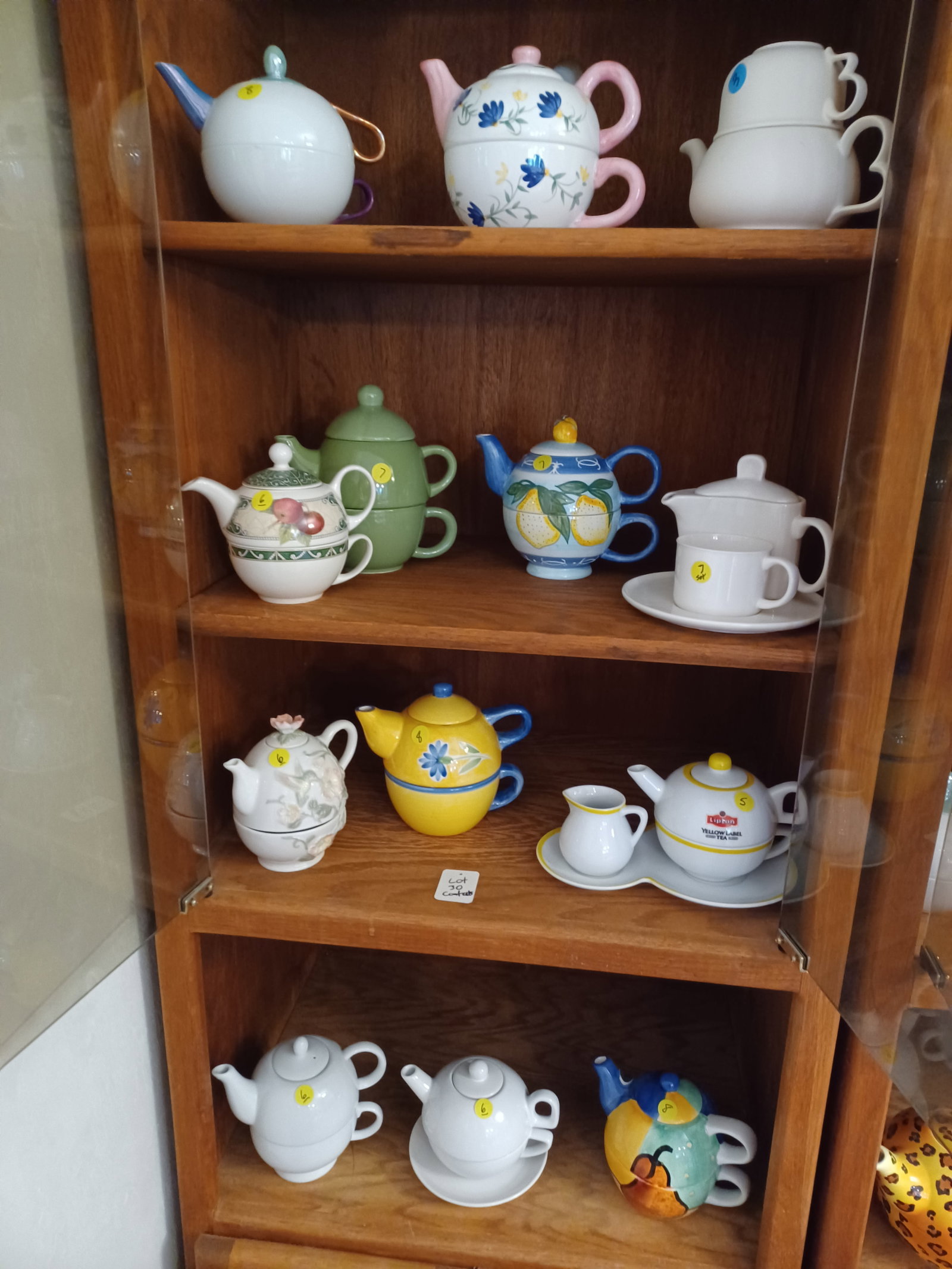 Lot of ALL Teapots seen in Cabinet: Lot of ALL Teapots seen in Cabinet