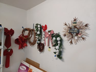 All wreaths and Christmas Decoration shown in photos on wall