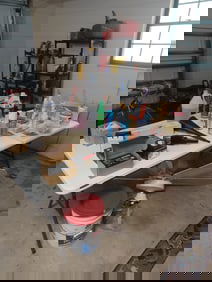 Shelves on wall and contents / includes everything seen on table and under / table not included