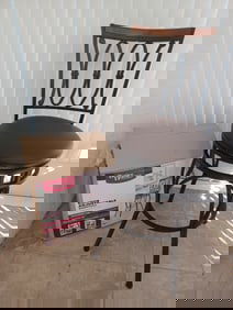 Pair of Bar Stools / One Still in bow / Assembled one needs  all screws tightened