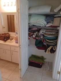 Large Lot includes Hallway Closet Contents, Bathroom Cabinet and Bathroom Closet Contents