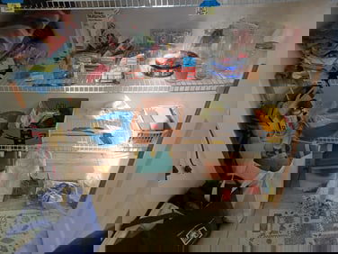 Entire Contents of bottom of closet/ all seen in photos