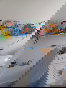 Contents of Laundry Shelf and Iron Board