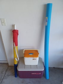 Beach Lot includes 2 coolers, umbrella and noodle