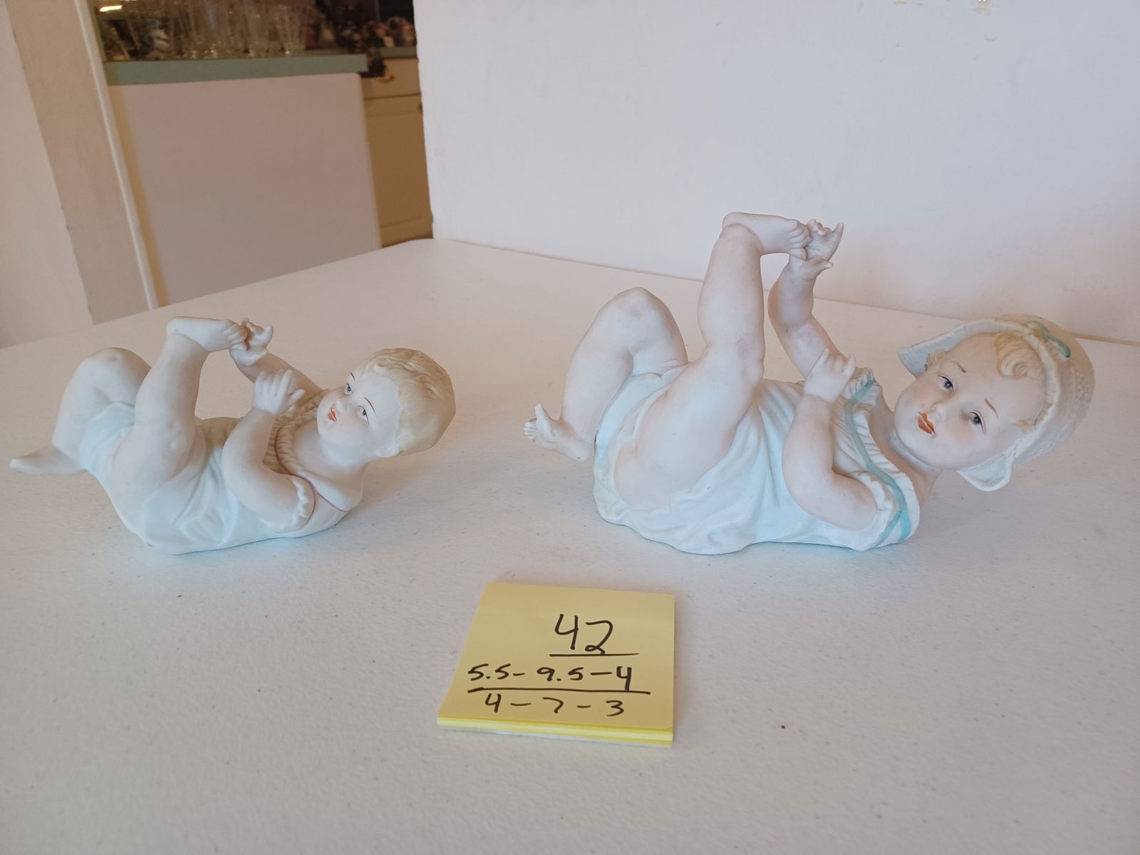 Pair of Vintage Porcelain Piano Babies: Pair of Vintage Porcelain Piano Babies