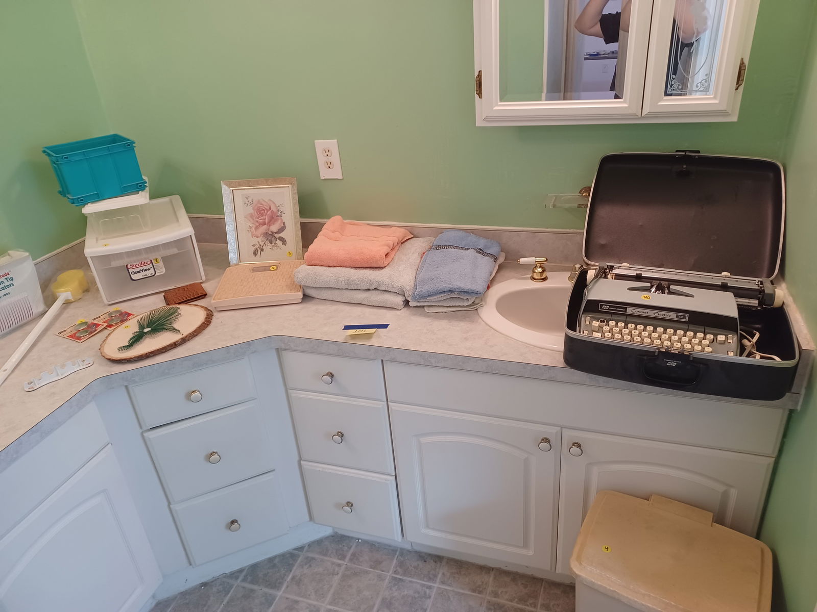 Entire Contents of Bathroom Vanity as seen including Coronet Electric Typewriter works (1 of 6)