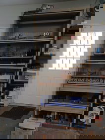 Metal Cabinet and Contents as seen / includes Vintage Kirby Vacume Parts