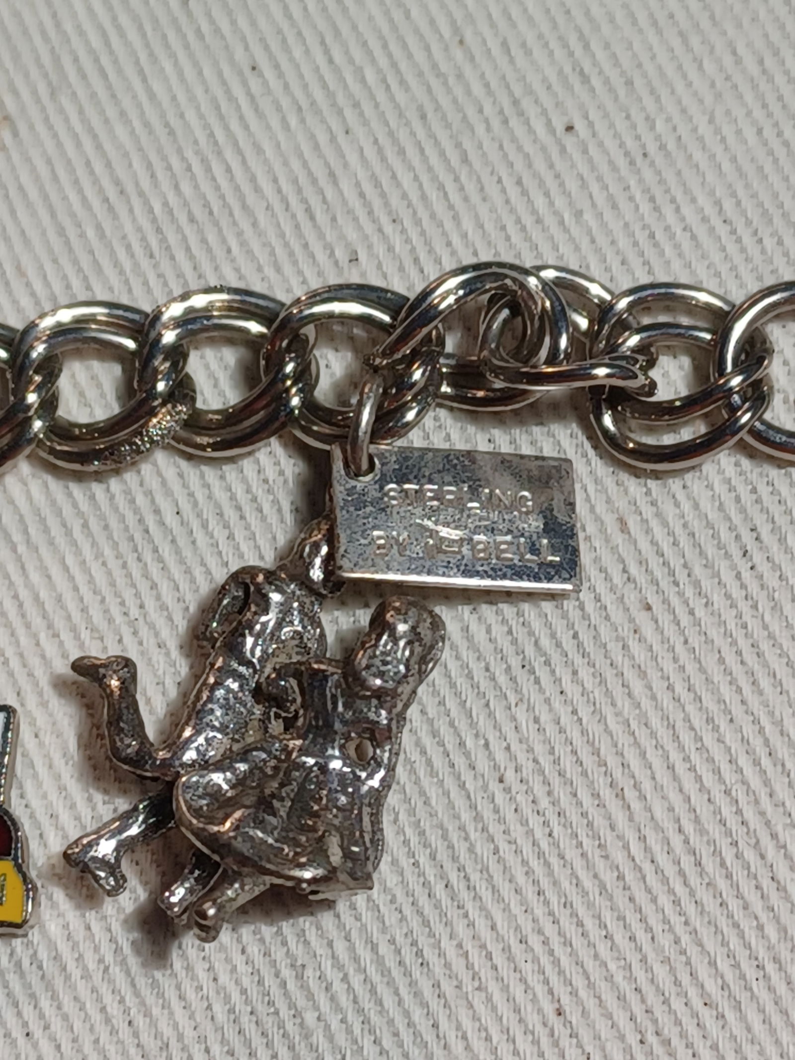 Charm Bracelet with a few Sterling Charms - 5